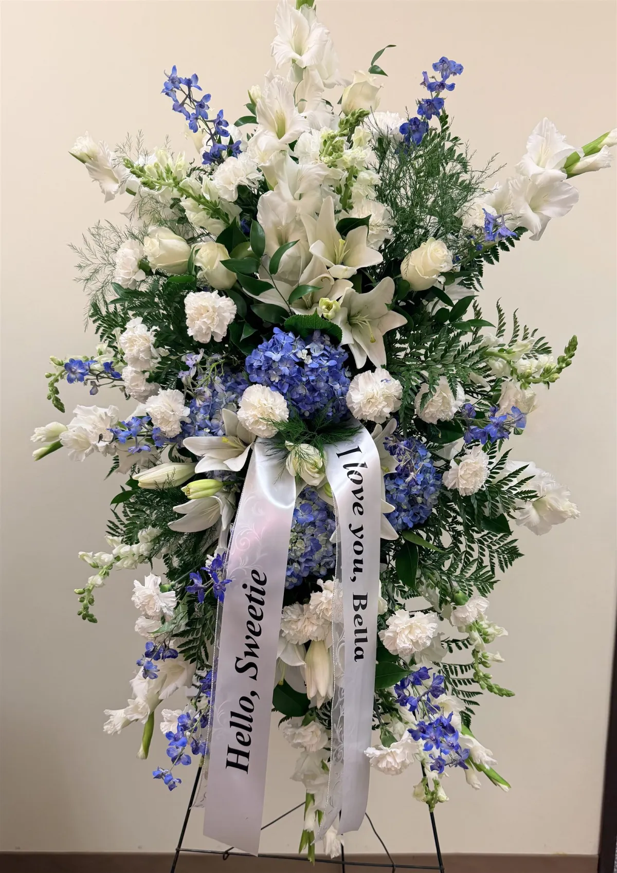 Blue and white standing spray funeral flowers Clark County